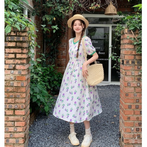 Real photos of a sophisticated, elegant French-style long dress with a flattering, slimming, and fairy-like floral print, perfect for a tea break.