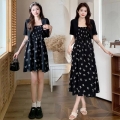 Plus-size women's summer new style, flattering and youthful, floral print suspender dress two-piece set.