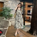 Real shot of a French-style tea break ink wash suspender dress for women, new summer style, loose and lazy vacation long dress.