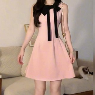 Petite, gentle, and elegant summer French-style new pink dress with a tie-up bow and slimming waist.