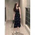 Pure and alluring floral print black slip dress for women, summer style, fitted waist, petite figure, pleated long skirt, French-style design.