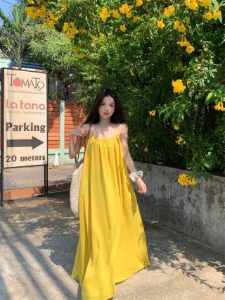 Sexy backless halter dress for beach vacation, new summer style, loose A-line skirt, soft yellow long skirt