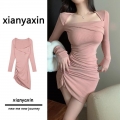Pure and alluring bodycon long-sleeved dress with a sophisticated design, a unique and understated style, slimming and flattering.