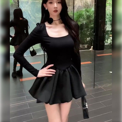 Petite, stylish, fitted little black dress with long sleeves, A-line tulip skirt, and puffy princess dress. Petite, stylish, fitted little black dress with long sleeves, A-line tulip skirt, and puffy princess dress.