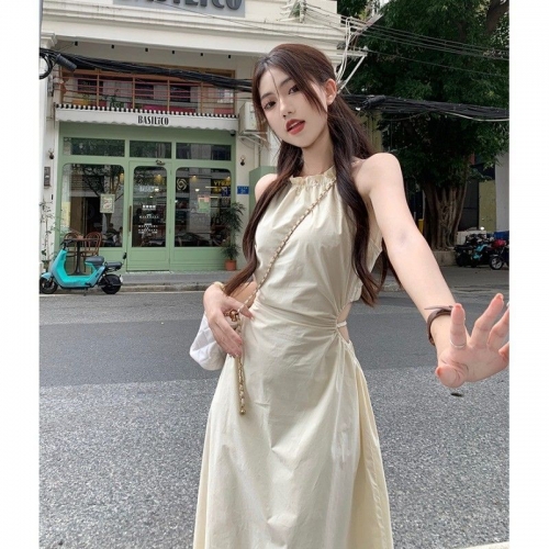 Pure and alluring halter neck suspender dress for women, summer design, elegant and stylish, hollowed-out waist, slimming and tassel long skirt