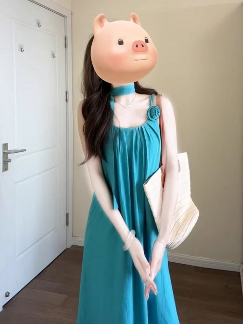 Brightly colored dopamine-infused Thai-style summer halter neck dress for women, perfect for beach vacations and travel in Xinjiang.