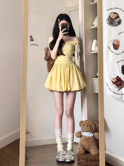 Pale yellow bow tie-up sundress for women, summer sweet design, A-line skirt with a tulip shape.