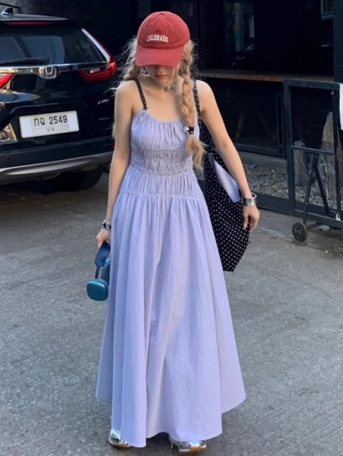 Blue spaghetti strap dress for women, summer 2025 new style, French beach resort look, fitted waist, long.