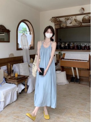 Blue sundress with straps, perfect for a beach vacation look, new spring 2025 style, loose fit, backless, tie-up, A-line length. Blue sundress with straps, perfect for a beach vacation look, new spring 2025 style, loose fit, backless, tie-up, A-line length.