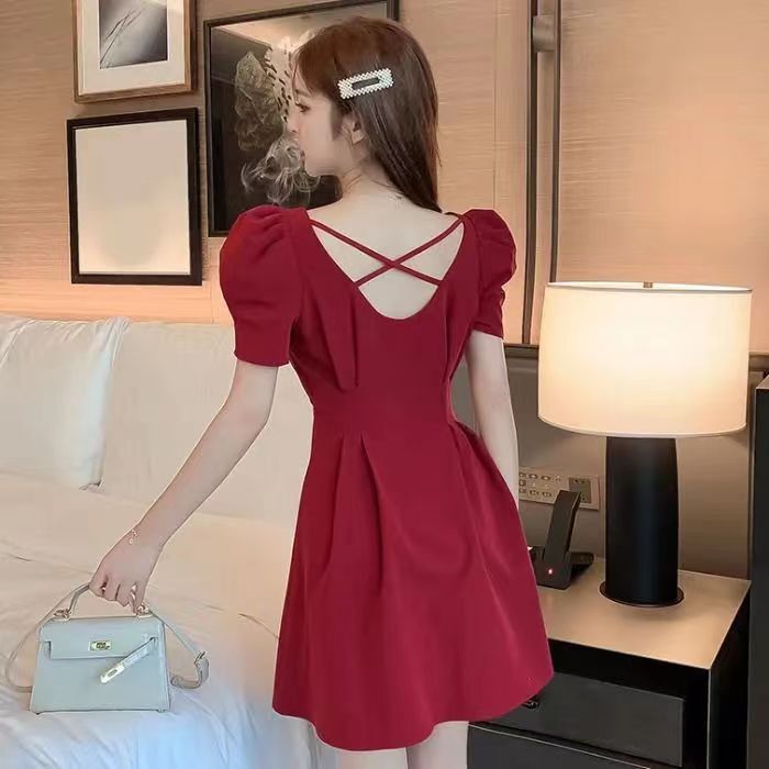 Summer Korean style women's dress with a slim waist, sexy square neck, puff sleeves, and elegant style.