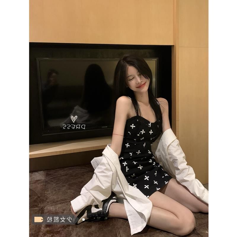 Women's summer sexy low-cut strappy A-line mini dress with bow print, perfect for summer and the beach.