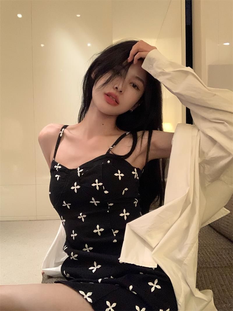 Women's summer sexy low-cut strappy A-line mini dress with bow print, perfect for summer and the beach.