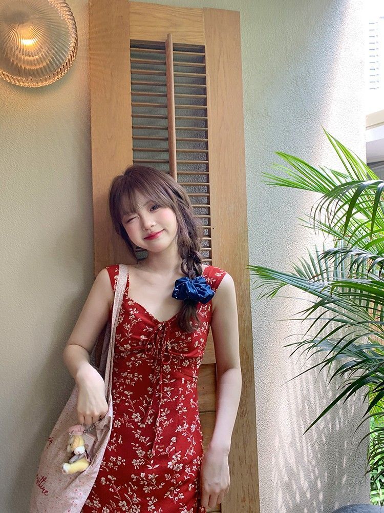 French-style red floral print sundress for women, perfect for summer 2025, ideal for beach vacations.