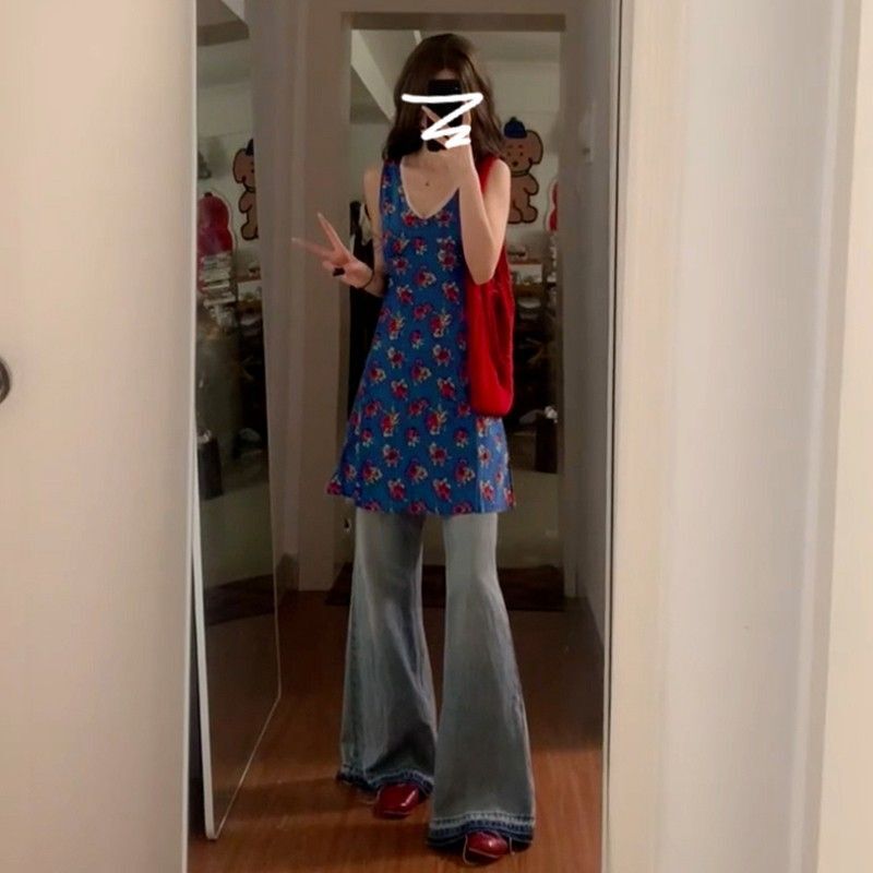 French-style blue sleeveless floral print vest dress for women, new summer 2025 style, beach vacation vibe.