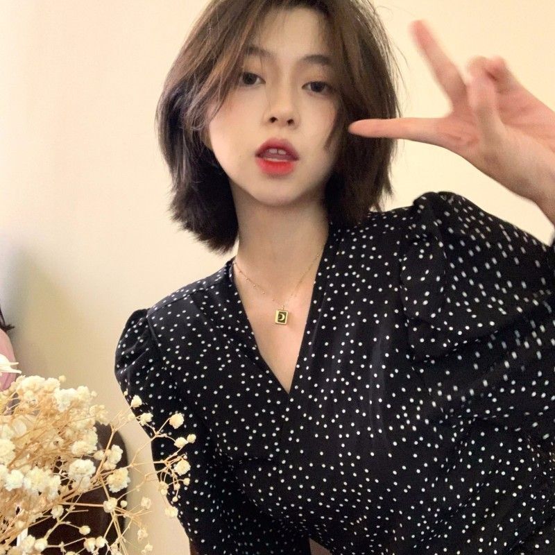 Black polka dot floral print long-sleeved dress for women, autumn 2025 new style, French Hepburn style.