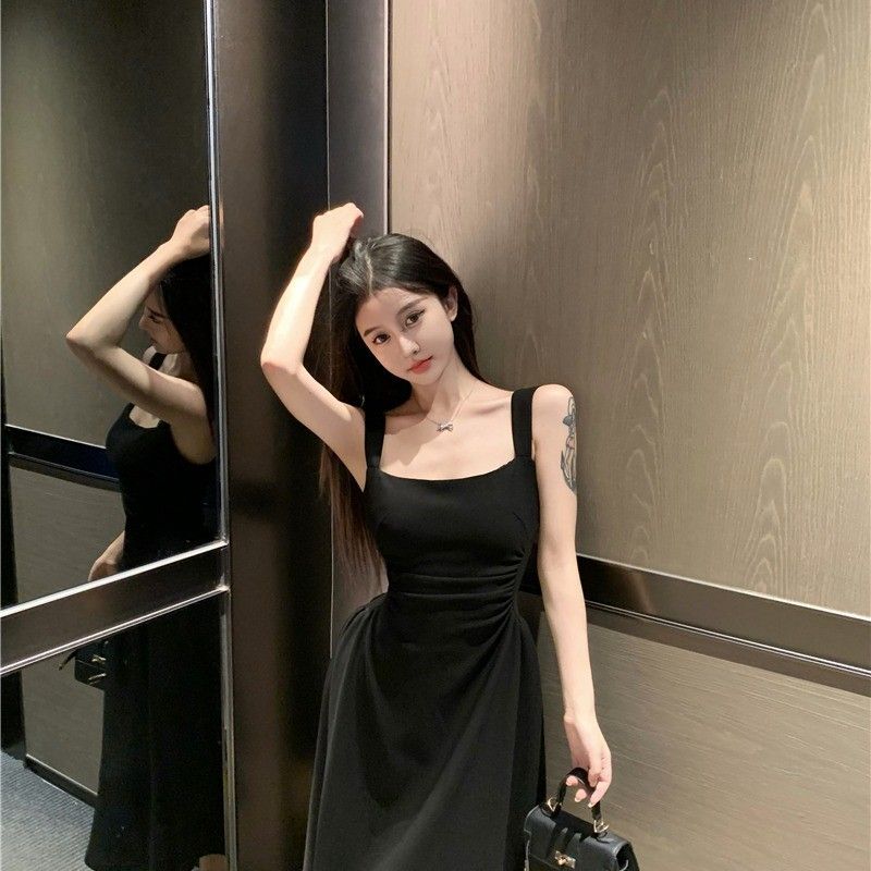 French chic and sophisticated, petite white slip dress with a cinched waist, perfect for spring and summer.