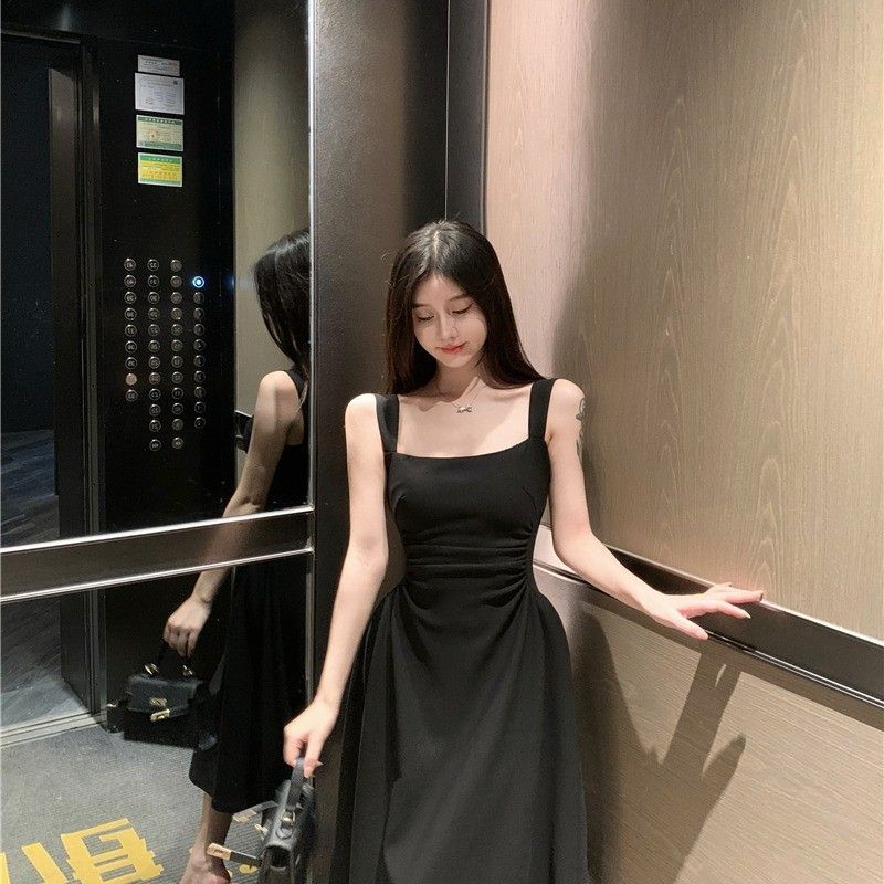 French chic and sophisticated, petite white slip dress with a cinched waist, perfect for spring and summer.