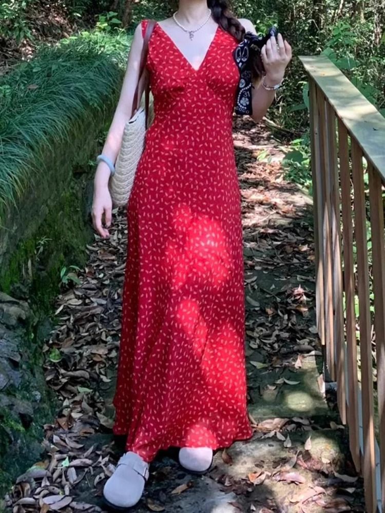 Seaside vacation style red V-neck floral sleeveless dress for women, spring 2025 new style, high-end feel.