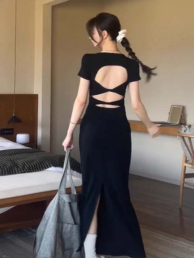 Hepburn-style French black backless dress for women, summer 2024 new style, high-end feel, slit, slim fit, bodycon.