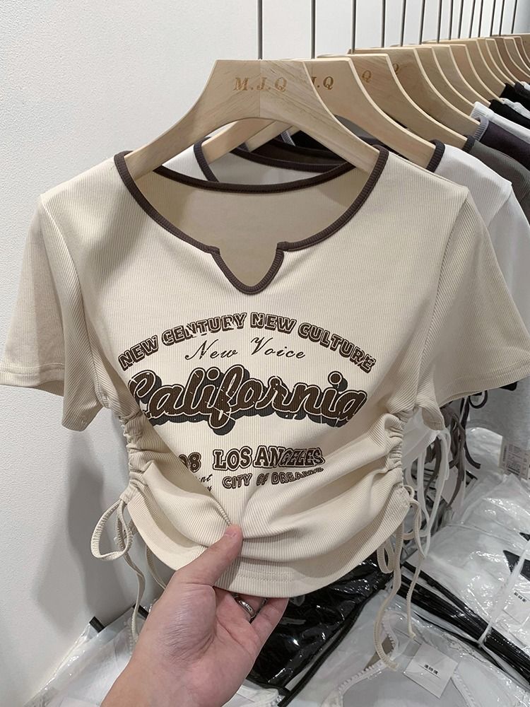American retro letter print short-sleeved T-shirt for women, V-neck, drawstring design, new summer 2023 style.