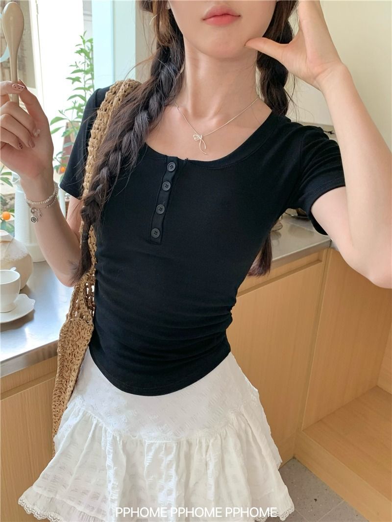 92% rayon ribbed short-sleeved T-shirt with 8% spandex and a flattering, round neck design. Features a pleated, slim fit and a fitted waist.